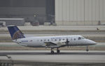 N235SW @ KLAX - Landing at LAX on 7R - by Todd Royer