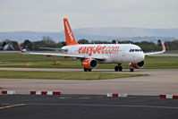 G-EZOE @ EGCC - aircraft taxing out to the runway for take off runway in use 05L