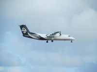 ZK-NEU @ NZAA - taken through car windscreen - but not too fuzzy. On finals to AKL - by magnaman