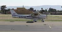 N787SP @ KRHV - Trade Wind's 2001 Cessna 172SP taxing back to the hangar with a friendly wave from the instructor. - by Chris L.