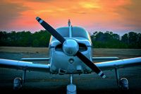 N7185F @ KBLM - N7185F with sunset in the background. - by Mike Grossman