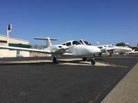 N2967D @ KRHV - Nice Air's Piper Seminole with a Conquest II next to it. - by Chris L.