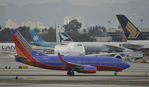 N205WN @ KLAX - Departing LAX on 7L - by Todd Royer