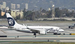N627AS @ KLAX - Taxiing to gate at LAX - by Todd Royer