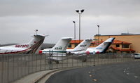 N117HH @ KMRY - KMRY near Del Monte Aviation FBO ramp - N117HH on the end - will depart later in the day. - by Tom Vance
