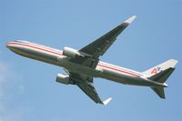 N394AN @ LFPG - American Airlines Boing 767-323ER, Take off rwy 27L, Roissy Charles De Gaulle airport (LFPG-CDG) - by Yves-Q