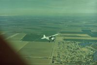 N5248Z - 48Z over the Calif central valley with 1Q4 on the left and the San Joaquin river on the right. View is to the north.