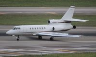 N28US @ MIA - Falcon 50 - by Florida Metal
