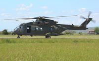 ZJ129 @ EGFP - Visiting RN Merlin helicopter coded N of 846 NAS. Still carrying the badge of the disbanded 78 Squadron RAF on the port side of the boom. - by Roger Winser