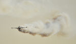 N133HH @ KCNO - Looks serious, but really just show smoke - by Todd Royer