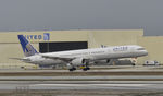N77871 @ KLAX - Landing at LAX on 7R - by Todd Royer