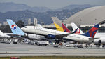 N380DA @ KLAX - Departing LAX - by Todd Royer