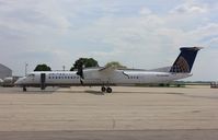 N333NG @ KRFD - DHC-8-402 - by Mark Pasqualino