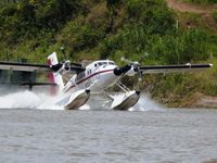 OB-1913-P - Taking off from the river near Iquitos - by confauna