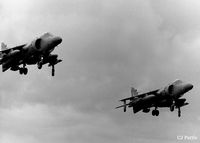 ZE695 @ EGQS - Dual takeoff at RAF Lossiemouth EGQS with ZE695 coded 718/VL (right) and ZD608 coded 717/VL, both from the FAA 899 NAS. Scanned from an old negative and desaturated on photoshop to B/W because of colour problems - by Clive Pattle
