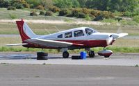 G-BTKX @ EGFH - Visiting Cherokee Archer II. Previously registered N47866. - by Roger Winser