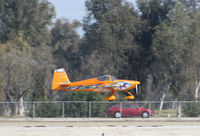 N727SM @ KTLR - Bakerfield, CA-based VANS RV-7A drag racing with red sedan @ Tulare, CA (Mefford Field) - by Steve Nation