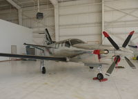 N422AZ @ KAPC - A local bare metal 2013 TBM 850 inside a huge hangar at Napa Airport, CA. - by Chris Leipelt