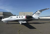 N510BT @ KAPC - A nice Cessna Citation Mustang sitting out in the middle of nowhere after the Jet Center was too busy and there were no more tie downs. - by Chris Leipelt