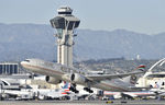 A6-LRA @ KLAX - Departing LAX - by Todd Royer
