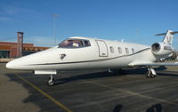 N803GJ @ KLVK - A 2013 LearJet 55 parked at transient parking visiting Livermore Municipal Airport, CA. - by Chris Leipelt