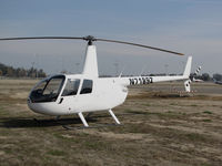 N7189Z @ KTLR - SMD Vineyards (Salinas, CA) Robinson R44 @ Mefford Field (Tulare, CA) for 2014 International Ag Expo - by Steve Nation