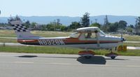 N8328M @ KRHV - A local 1969 Cessna 150 Aerobat with the checkered flag all over it at Reid Hillview Airport, CA. - by Chris Leipelt
