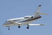 N284QS @ KSJC - A 2002 Falcon 2000 (NetJets Aviation) landing on runway 30L at San Jose International Airport, CA. - by Chris Leipelt