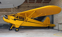 N42752 @ 12N - One of several lovely yellow Piper Cubs at Andover Aeroflex. - by Daniel L. Berek