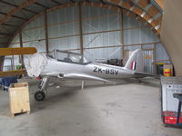 ZK-BSV @ NZAR - hiding in hangar at ardmore - by magnaman