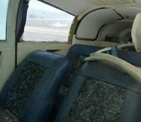 N2934L @ KRHV - The cabin of a  local 1967 Mooney M20C rotting at its usual parking spot at Reid Hillview Airport, CA. Believe it or not this guy still pays his parking fee. - by Chris Leipelt