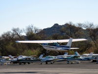 N704UT @ SZP - 1976 Cessna 150M, Continental O-200 100 hp, takeoff climb Rwy 04 - by Doug Robertson