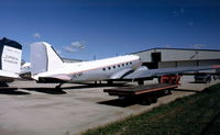 N104BF @ OSH - Scanned from slide.
Started life as 42-92712.
To RCAF as 963 then 12950.
Put on the US civil register as N104BF
Converted by Basler to BT-67 and sold to Mauretania Air Force as 5T-MAH. - by kenvidkid