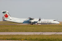 C-GGOY @ CYYZ - Landing in Toronto. - by Robert Jones