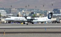 N447QX @ KRNO - DHC-8-402