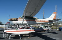 N9493Z @ KRHV - A local Cessna T206G on floats parked at Squadron 2 for maintenance. This is the first time this Cessna has moved from its tie down located in the south GA ramp. It has a brand new engine, with less than 50 hours and the owner is trying to sell it. - by Chris Leipelt