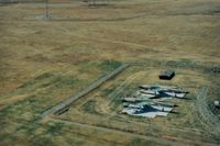 60-5385 - These two Republic F 105s were seen in the mid 80s near Davis,Calif. Since there was no airport in sight and the tent,my guess is National Guard training. Were gone in several years.