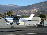 N9932H @ SZP - 1981 Cessna 182R SKYLANE, Continental O-470-U 230 Hp, flaps landing Rwy 22. 6,704' Hines Peak of the Topa Topa mountains in far background. - by Doug Robertson
