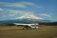 N4385E @ O46 - 85E at Weed airport in Northern California with towering Mt Shasta(14,163 feet) in the distance. With Weed being 2,163 feet,you are looking at a 11,220 foot rather large Hill !!