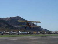 N66711 @ SZP - 1941 Boeing Stearman IB75A, Jacobs R755B2 275 Hp upgrade, takeoff climb Rwy 04 - by Doug Robertson