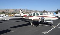 N587AN @ KRHV - A local Beechcraft Baron 58 (CALIFORNIA NICE AIR, CA) in a new parking spot near Discovery Air at Reid Hillview Airport, CA. It used to be parked under the shelters at the south end of the airport. - by Chris Leipelt
