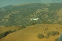 N9078E - 78E as it flys  along the Mt Hamilton range on a flight from Watsonville back home to Fremont,Calif.