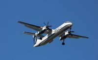 N405QX @ KSEA - DHC-8-402