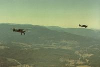 N3942E - 42E in a race (well almost) with 78E as they fly over Highway 49 which runs through almost all the  California Mother Lode gold communities.