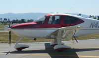 N424SW @ KRHV - A local Cirrus SR22 clear of runway 31R taxing back to its tie down under the shelters at Reid Hillview Airport, CA. - by Chris Leipelt