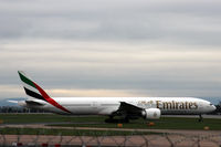 A6-EDV @ EGCC - Taxy for departure from Manchester EGCC - by Clive Pattle