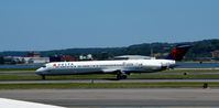 N947DL @ KDCA - Landing roll National - by Ronald Barker