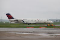 N416SW @ KCID - Taxiing for departure in light rain - by Glenn E. Chatfield