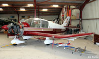 G-BAHL @ EGBR - Undergoing maintenance at Breighton EGBR - note: 2 mini Chipmunk models nestled under its wing. - by Clive Pattle