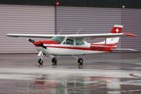 HB-CNM @ LSZG - waiting in the rain - by sparrow9